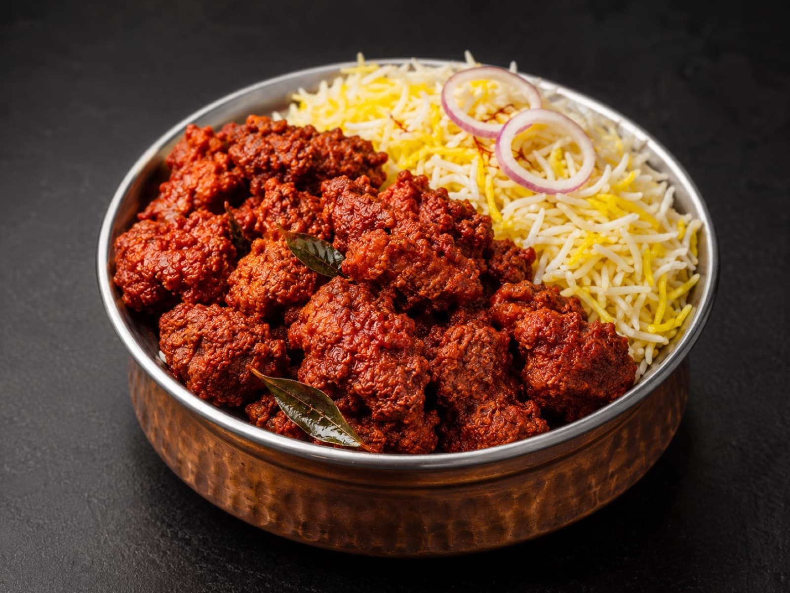 Chicken 65 biryani in a copper handi