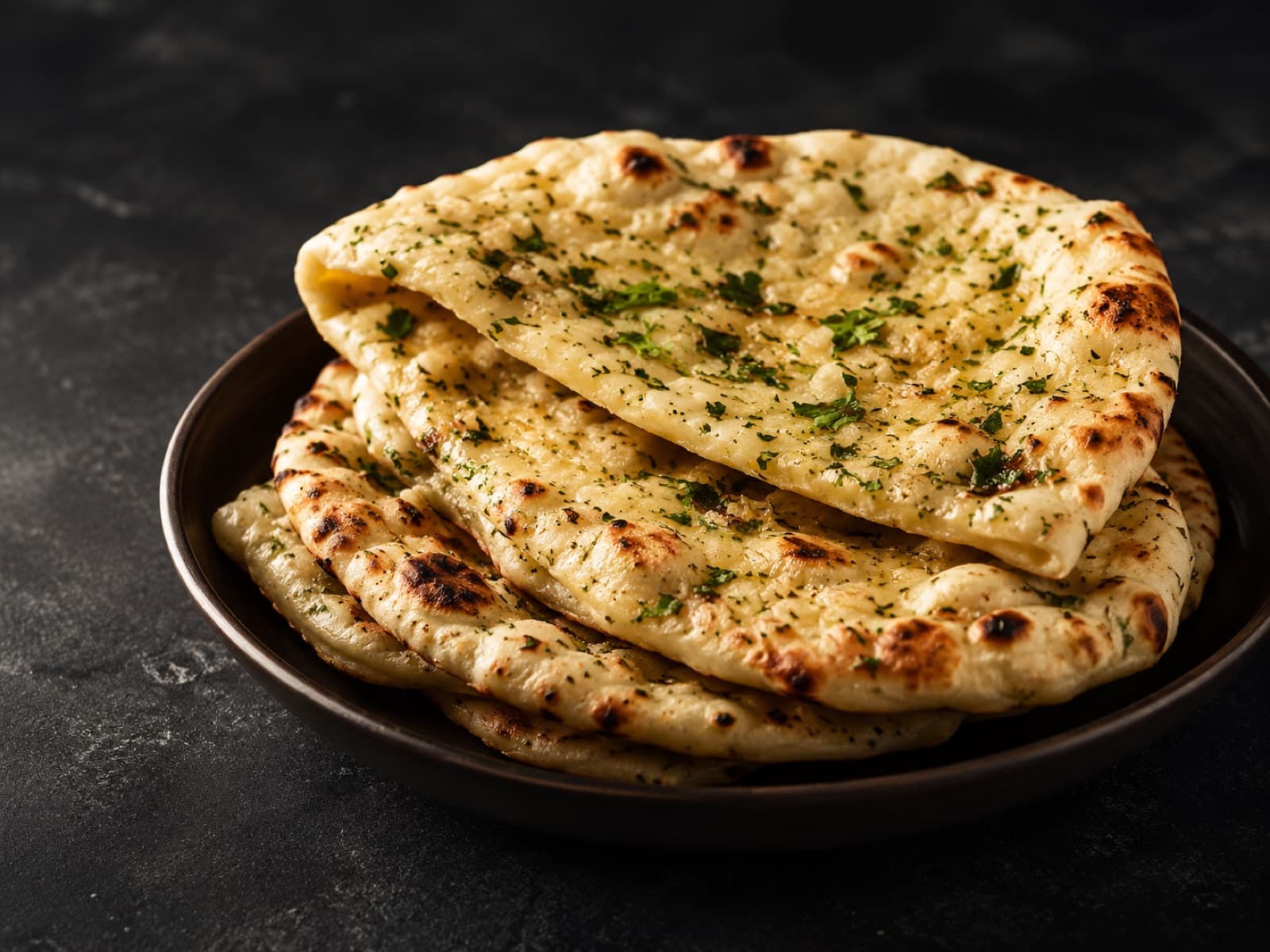 Stack of naan blistered in the tandoor